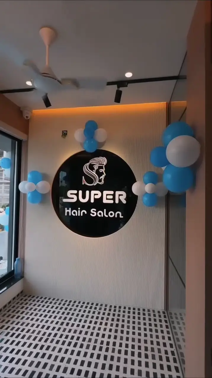 Barber chair in front of an arch mirror